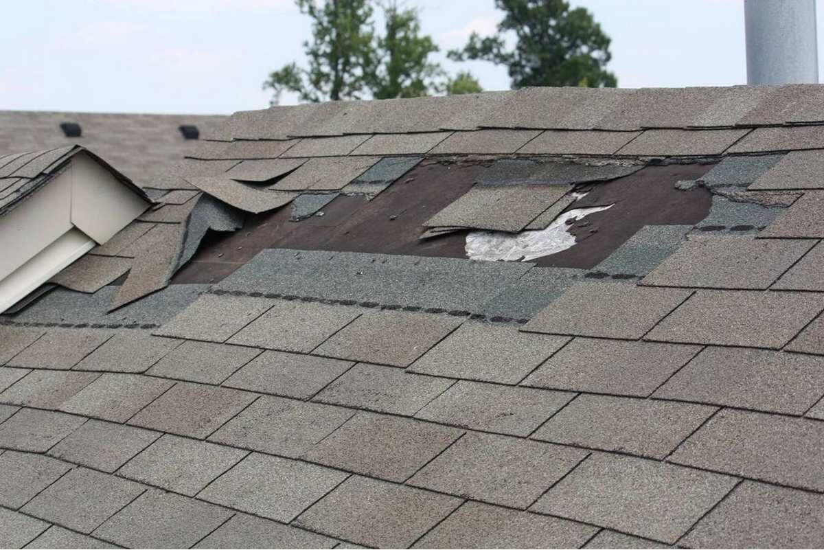 compare-roofing-shingles-Damaged-Roof-Shingles